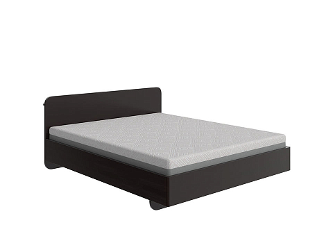 Кровать Minima - Кровать из массива с округленным изголовьем. 